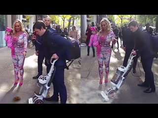 a special assistant who vacuums the street for her